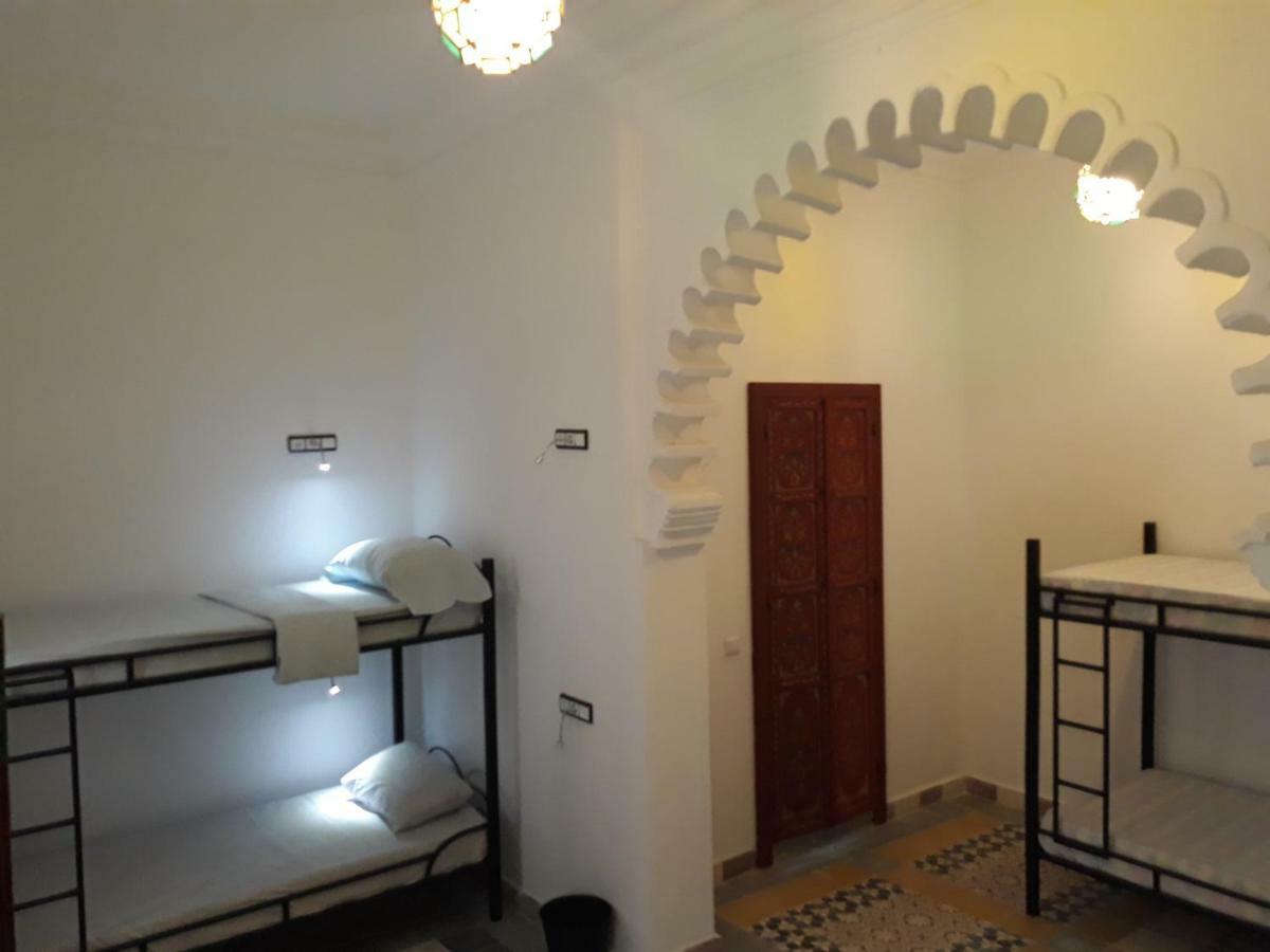 Cama en habitación compartida mixta de 8 camas